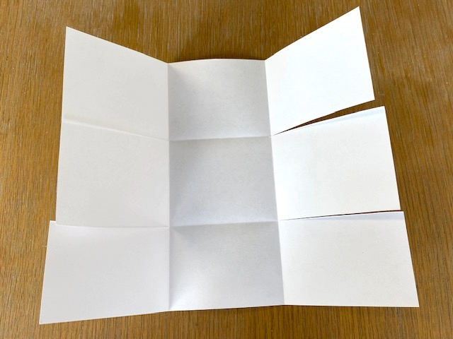White paper folded into nine square